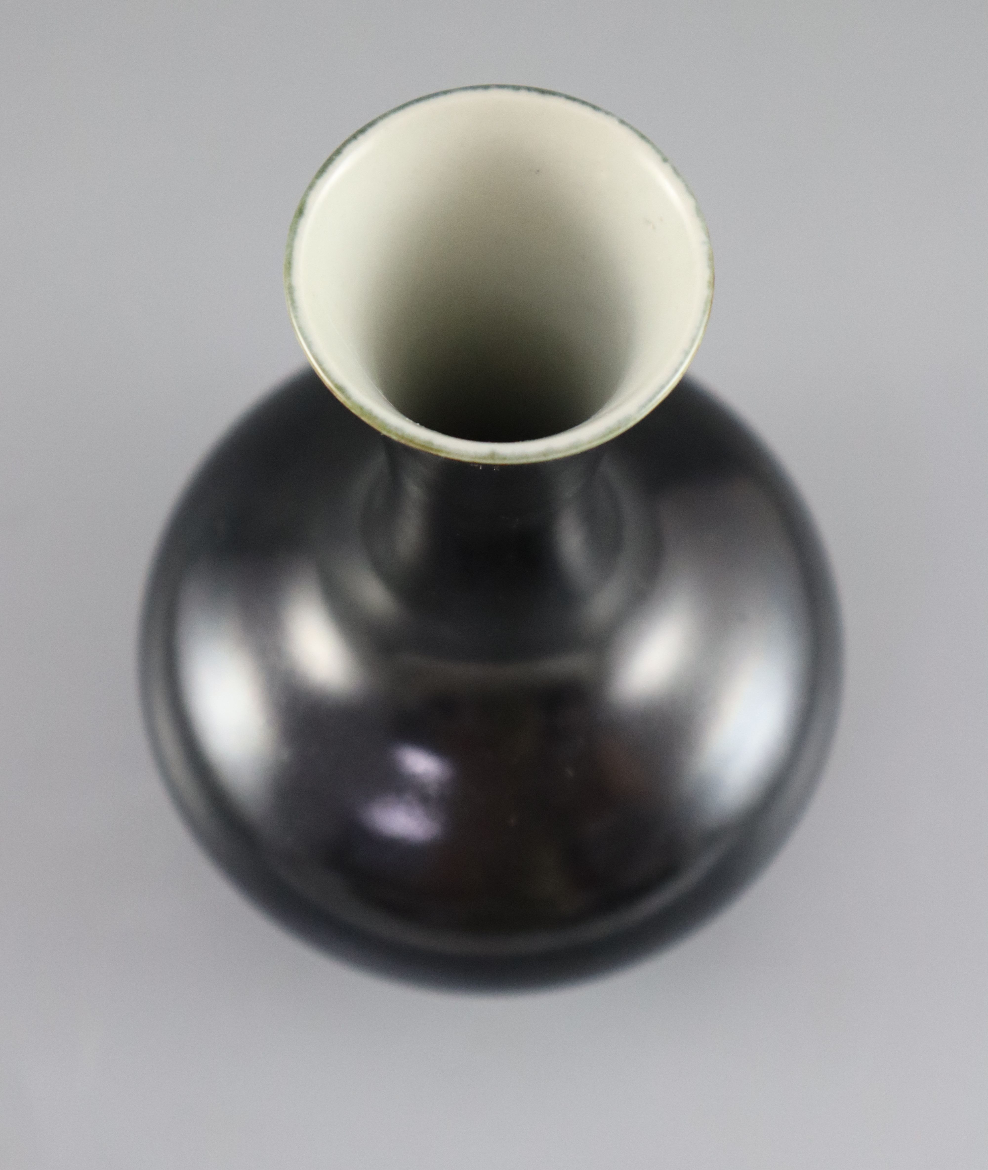 A Chinese black glazed bottle vase, possibly 18th century, 17cm high